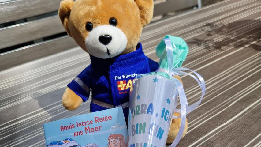 Wünschewagen-Bär mit Schultüte
